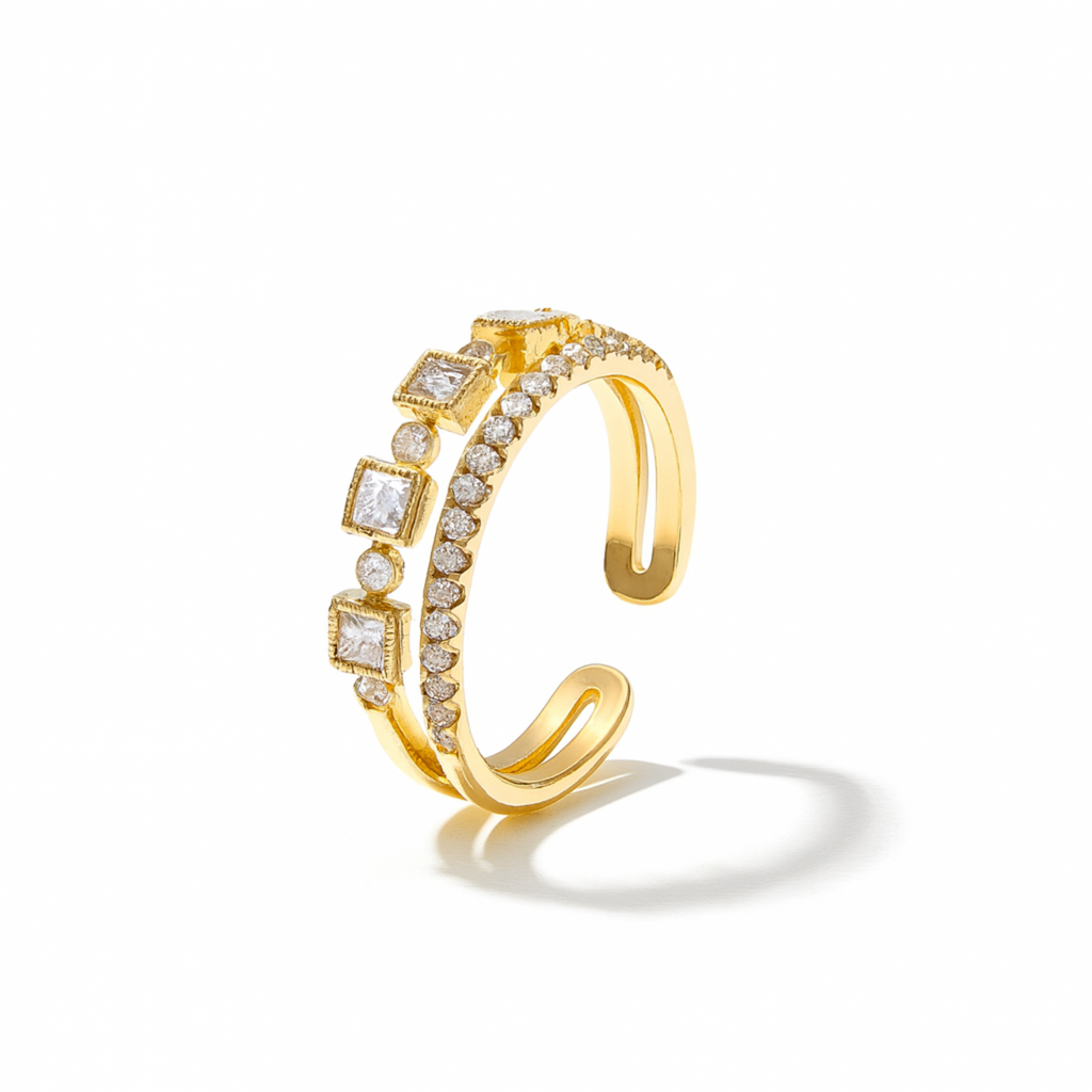 Gold ring with diamond accents on a white background