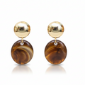 Pair of earrings with gold tops and brown circular stones 